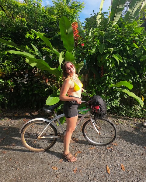 Woman on bike smiling