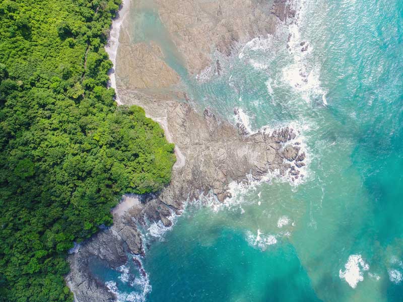 An aerial view of the ocean and land