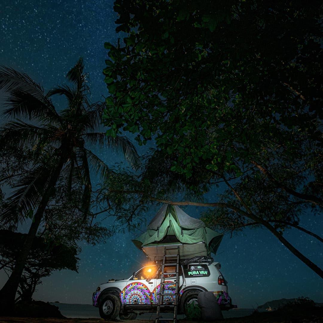 The night life with a jeep glowing in the dark